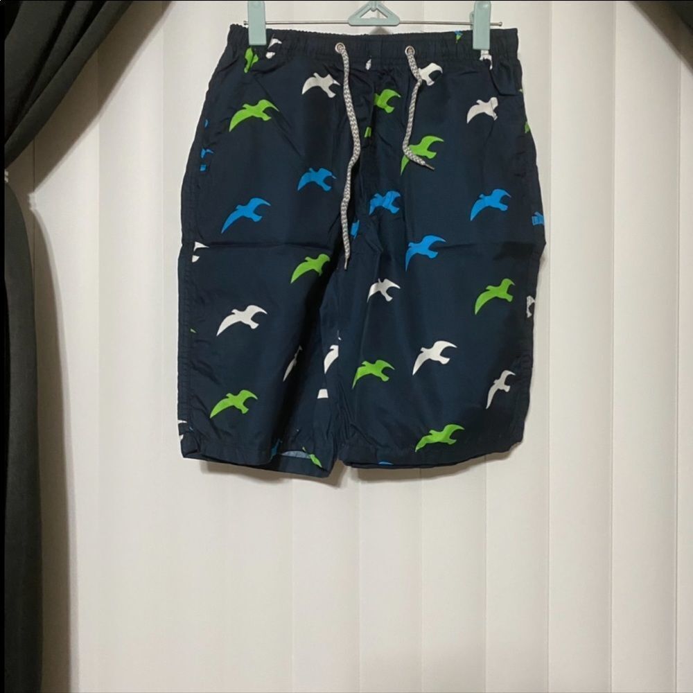 Mens/Boys blue swim trunks with birds